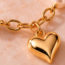 Gold heart pendant close-up